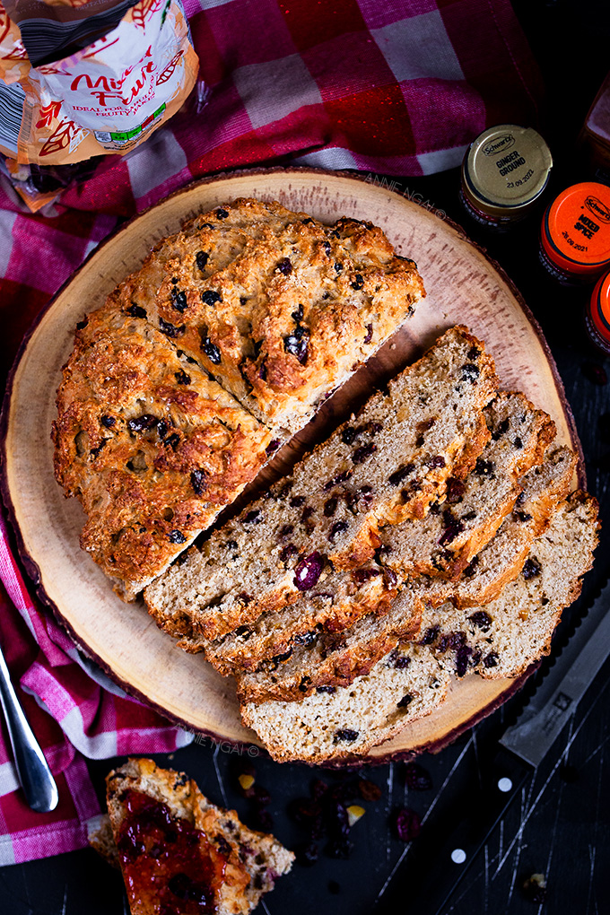 This Festive Spiced Soda Bread is a Christmassy twist on a classic Irish soda bread. Full of currants, sultanas, raisins, mixed peel and cranberries, it's flavourful, soft and perfect with a good serving of butter!